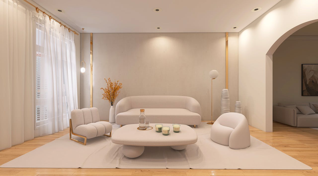 Stylish modern living room with soft beige furniture and elegant decor.